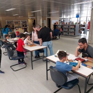 Domingoédia de biblioteca1- Eduardo Merlino